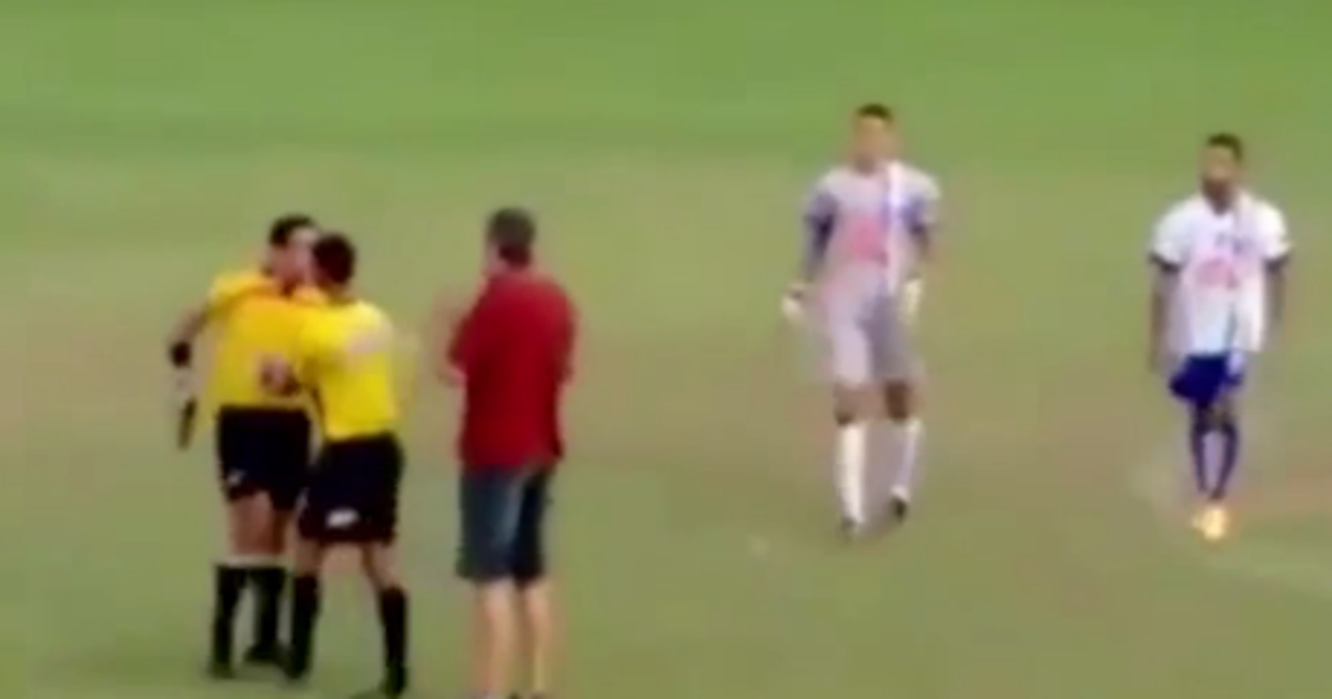 Watch Brazilian soccer referee pulls out gun on pitch after alleged